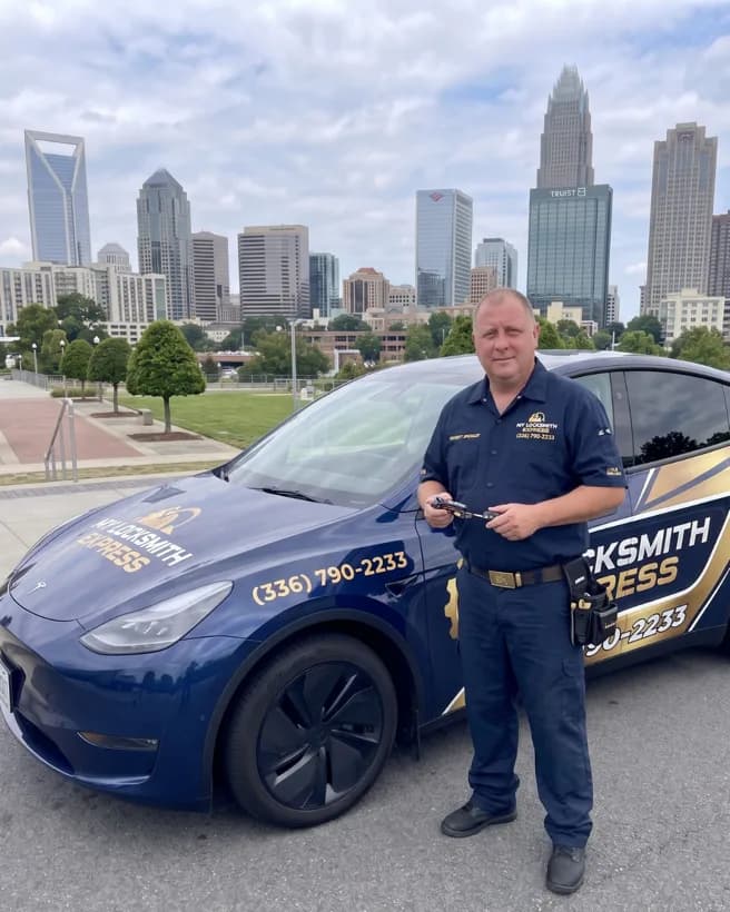 My Locksmith Express technician holding car keys beside the branded mobile service van in Charlotte, NC