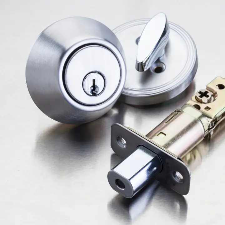 Locksmith Mooresville emergency locksmith mooresville nc Licensed locksmith installing new deadbolt lock on front door providing residential security services