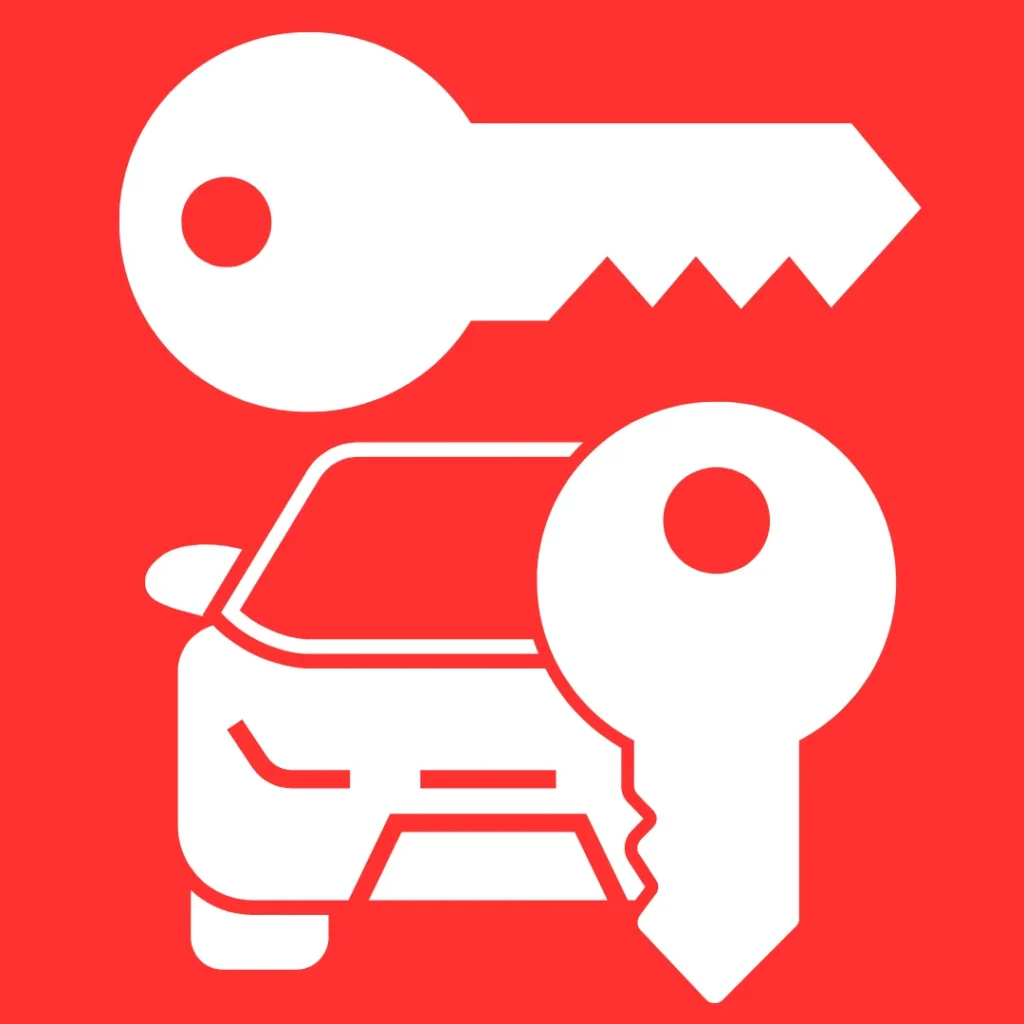 Variety of car keys including standard, transponder, and smart keys on a table